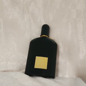 Tom Ford Black Bottle with Gold Plaque Accent